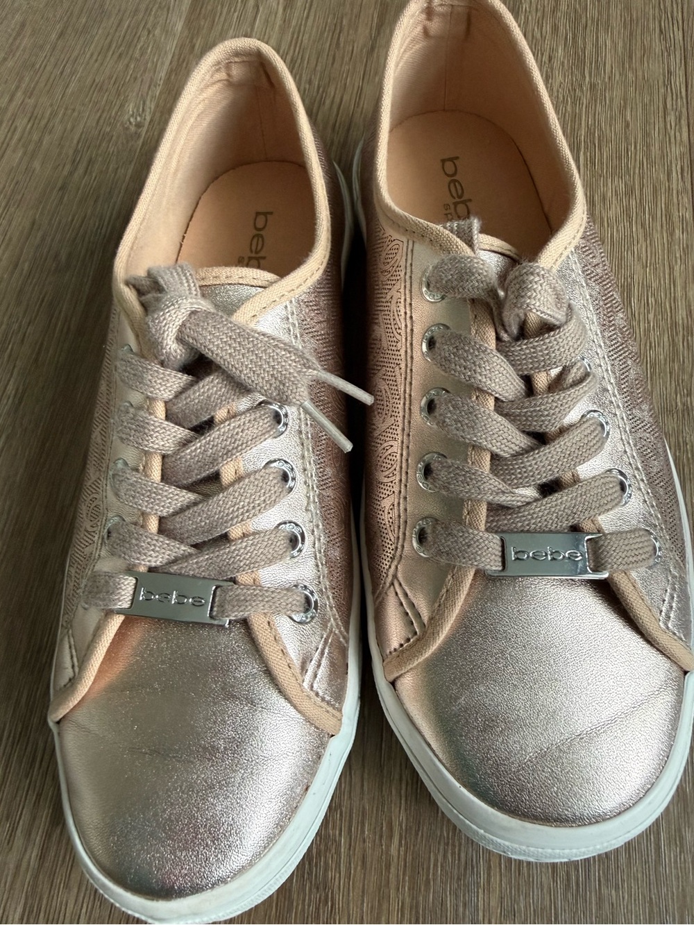 bebe Women's Metallic Rose Sneakers
